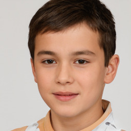 Joyful white child male with short  brown hair and brown eyes