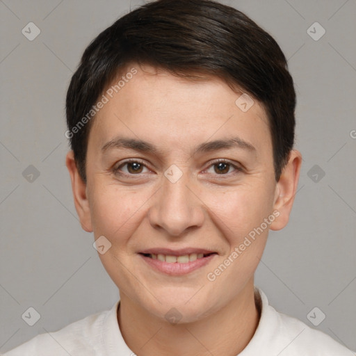 Joyful white young-adult female with short  brown hair and brown eyes