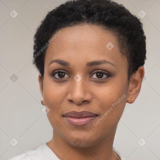 Joyful black young-adult female with short  black hair and brown eyes