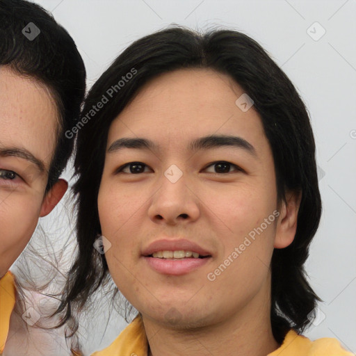 Joyful asian young-adult female with medium  black hair and brown eyes