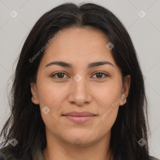 Joyful latino young-adult female with long  brown hair and brown eyes