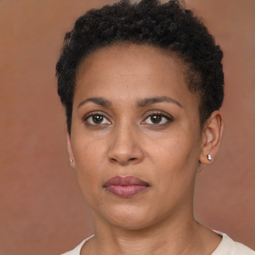Neutral black young-adult female with short  brown hair and brown eyes