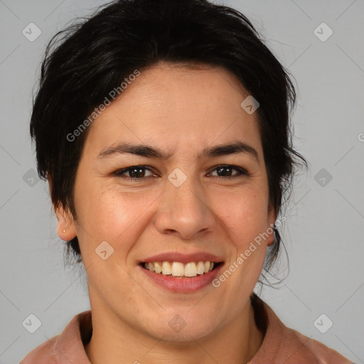 Joyful white adult female with medium  brown hair and brown eyes