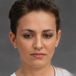 Neutral white young-adult female with short  brown hair and brown eyes