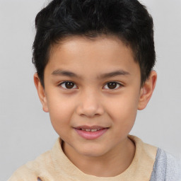 Joyful white child male with short  brown hair and brown eyes