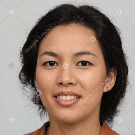 Joyful asian young-adult female with medium  brown hair and brown eyes