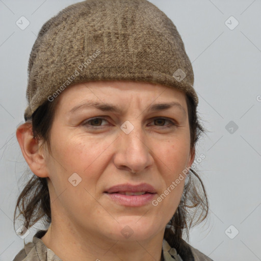 Joyful white adult female with short  brown hair and grey eyes