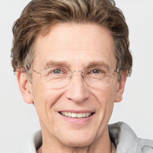 Joyful white middle-aged male with short  brown hair and grey eyes