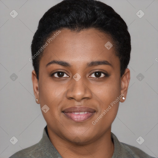 Joyful black young-adult female with short  black hair and brown eyes