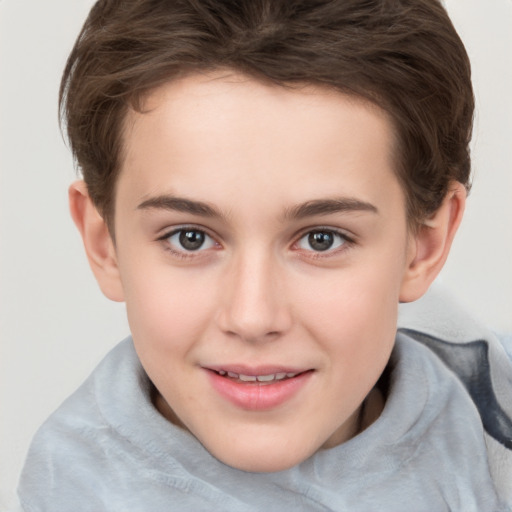 Joyful white child female with short  brown hair and brown eyes