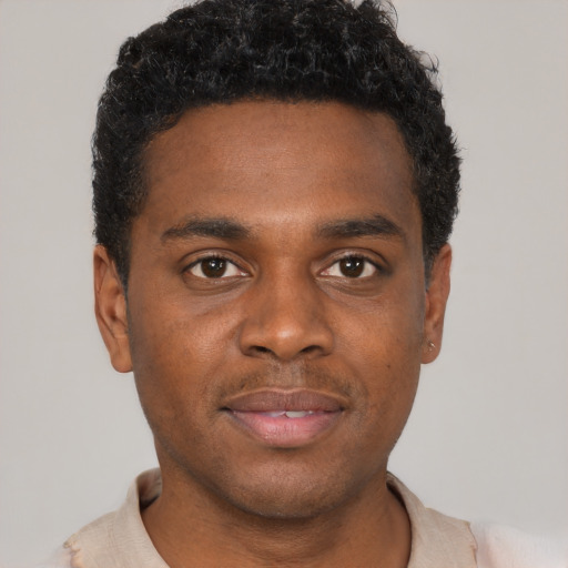 Neutral black young-adult male with short  brown hair and brown eyes