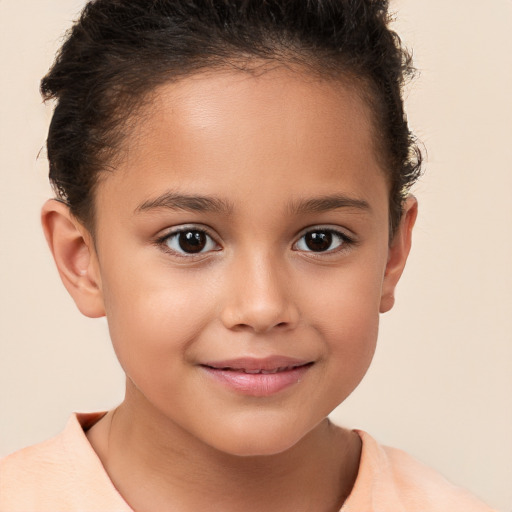 Joyful white child female with short  brown hair and brown eyes