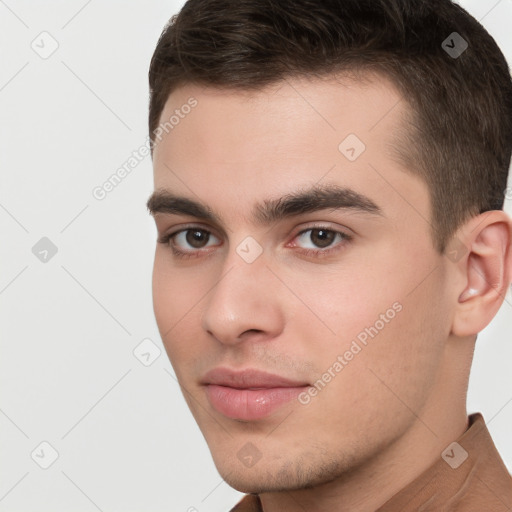 Neutral white young-adult male with short  brown hair and brown eyes