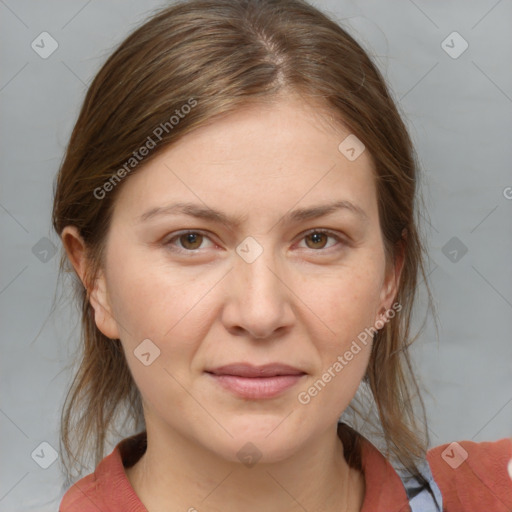 Joyful white adult female with medium  brown hair and grey eyes