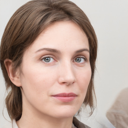 Neutral white young-adult female with medium  brown hair and grey eyes