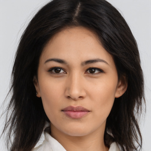 Neutral latino young-adult female with long  brown hair and brown eyes