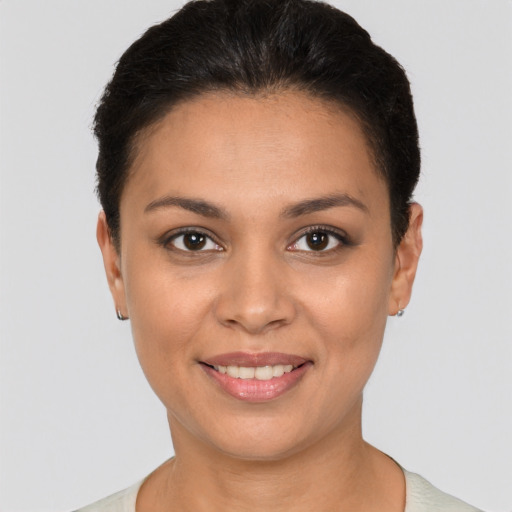 Joyful white young-adult female with short  brown hair and brown eyes