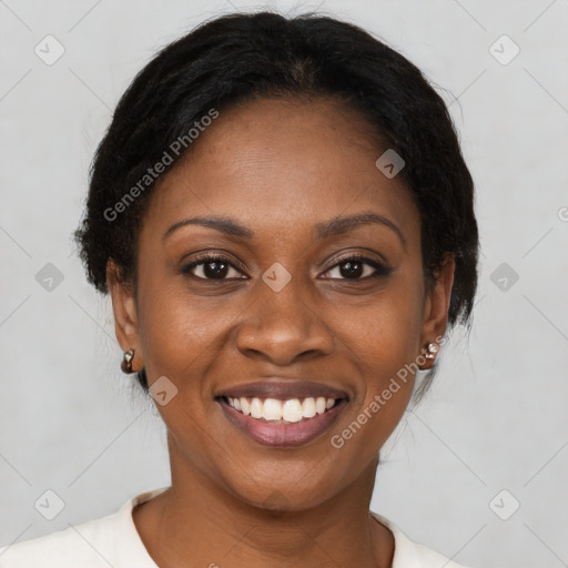 Joyful black young-adult female with medium  brown hair and brown eyes