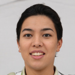 Joyful asian young-adult female with short  brown hair and brown eyes