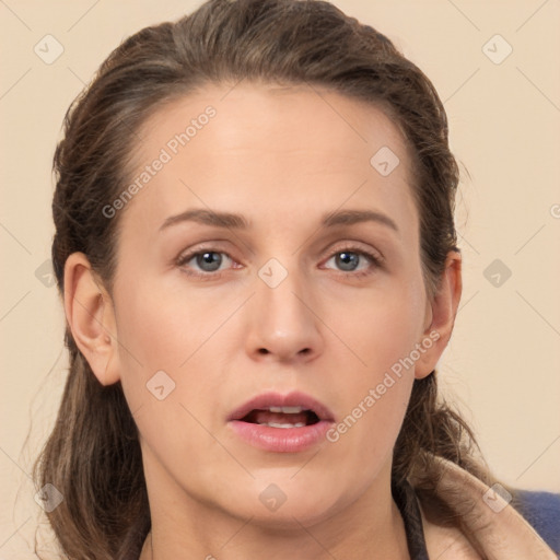 Neutral white young-adult female with long  brown hair and brown eyes