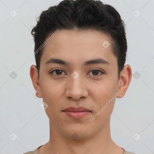 Joyful latino young-adult male with short  brown hair and brown eyes