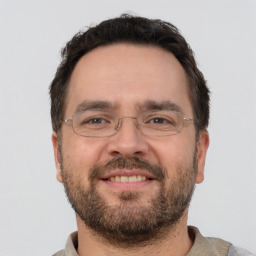 Neutral white adult male with short  brown hair and brown eyes