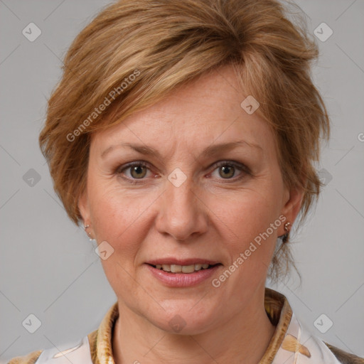 Joyful white adult female with medium  brown hair and brown eyes