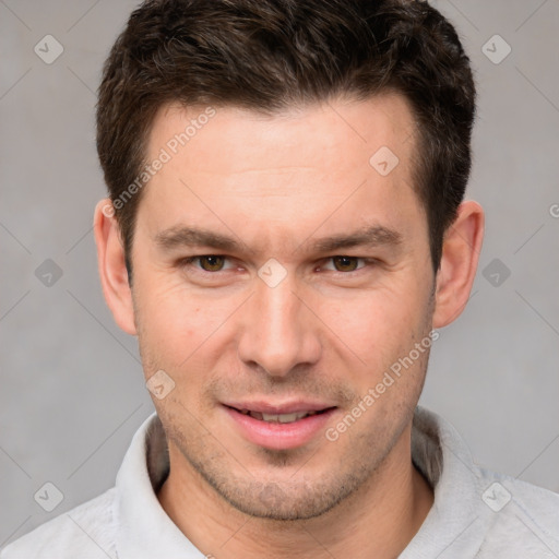 Joyful white young-adult male with short  brown hair and brown eyes