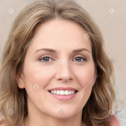 Joyful white young-adult female with medium  brown hair and green eyes