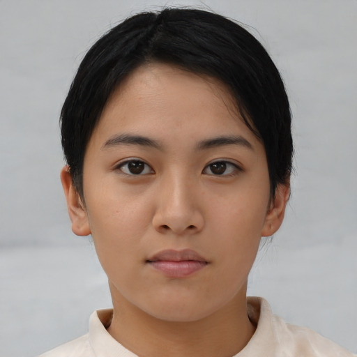 Neutral asian young-adult female with short  brown hair and brown eyes