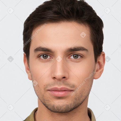 Neutral white young-adult male with short  brown hair and brown eyes