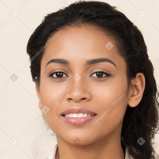 Joyful latino young-adult female with long  black hair and brown eyes