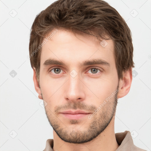 Neutral white young-adult male with short  brown hair and grey eyes