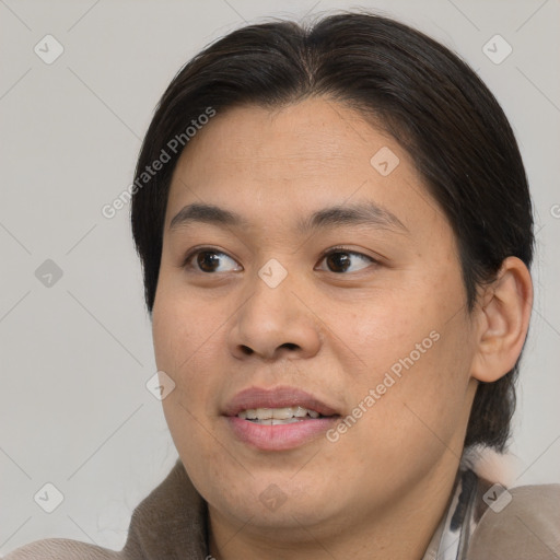 Joyful white young-adult female with medium  brown hair and brown eyes