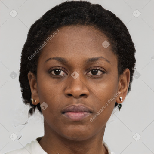 Neutral black young-adult female with short  brown hair and brown eyes