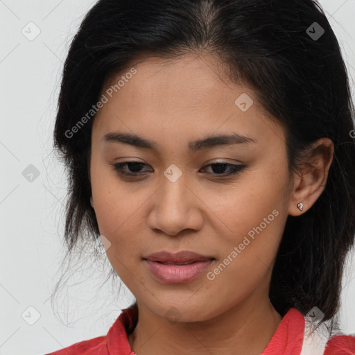 Joyful latino young-adult female with medium  brown hair and brown eyes