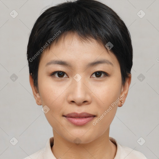 Joyful asian young-adult female with short  black hair and brown eyes