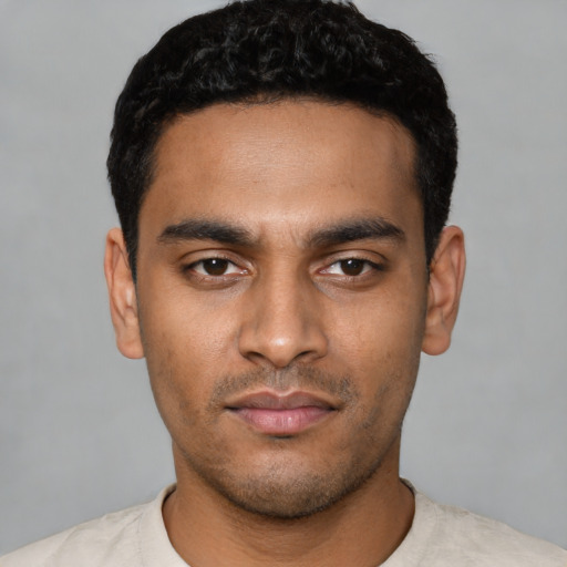 Neutral latino young-adult male with short  black hair and brown eyes