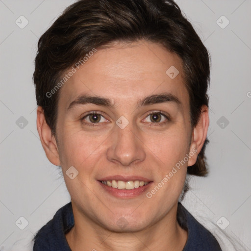 Joyful white adult female with medium  brown hair and brown eyes