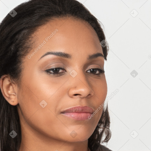 Joyful latino young-adult female with long  brown hair and brown eyes