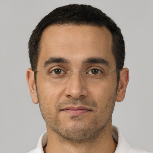Neutral white young-adult male with short  black hair and brown eyes