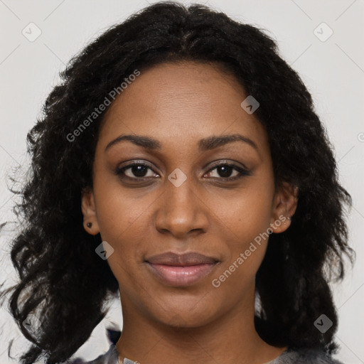 Joyful black young-adult female with medium  black hair and brown eyes