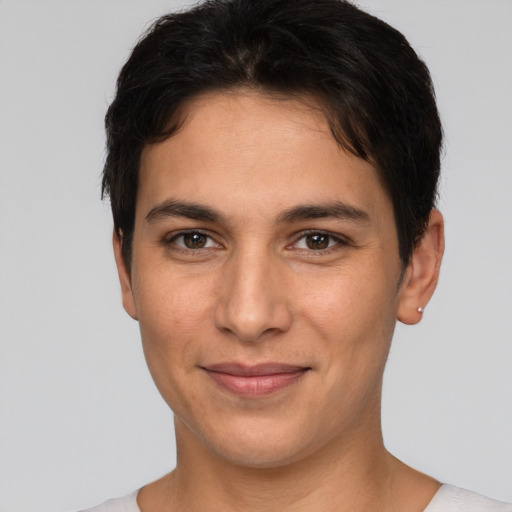 Joyful white young-adult male with short  brown hair and brown eyes