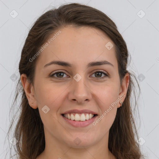 Joyful white young-adult female with long  brown hair and grey eyes