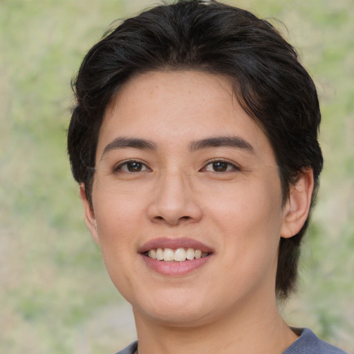 Joyful asian young-adult female with medium  brown hair and brown eyes