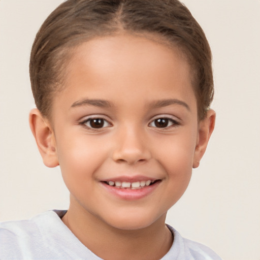 Joyful white child female with short  brown hair and brown eyes