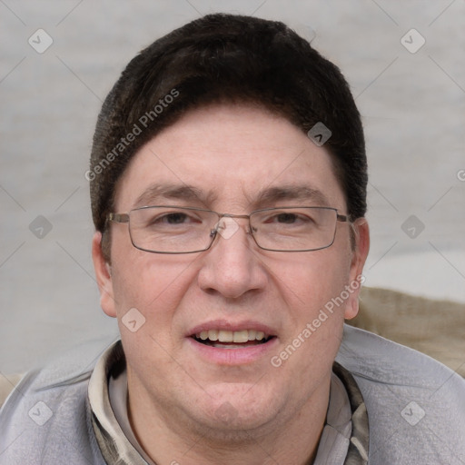 Joyful white adult male with short  brown hair and grey eyes