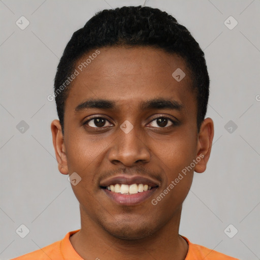 Joyful black young-adult male with short  black hair and brown eyes