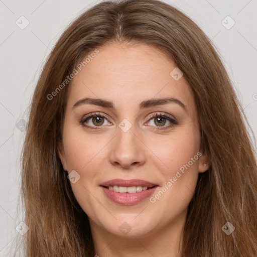 Joyful white young-adult female with long  brown hair and green eyes