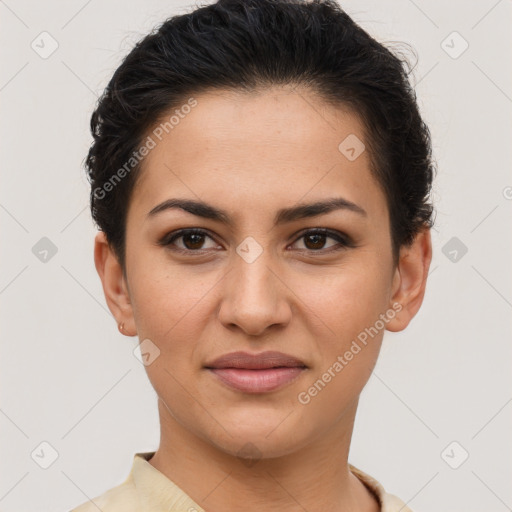 Joyful latino young-adult female with short  brown hair and brown eyes